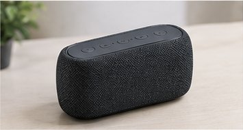 Kompakter Bluetooth-Lautsprecher mit dunklem Stoffbezug